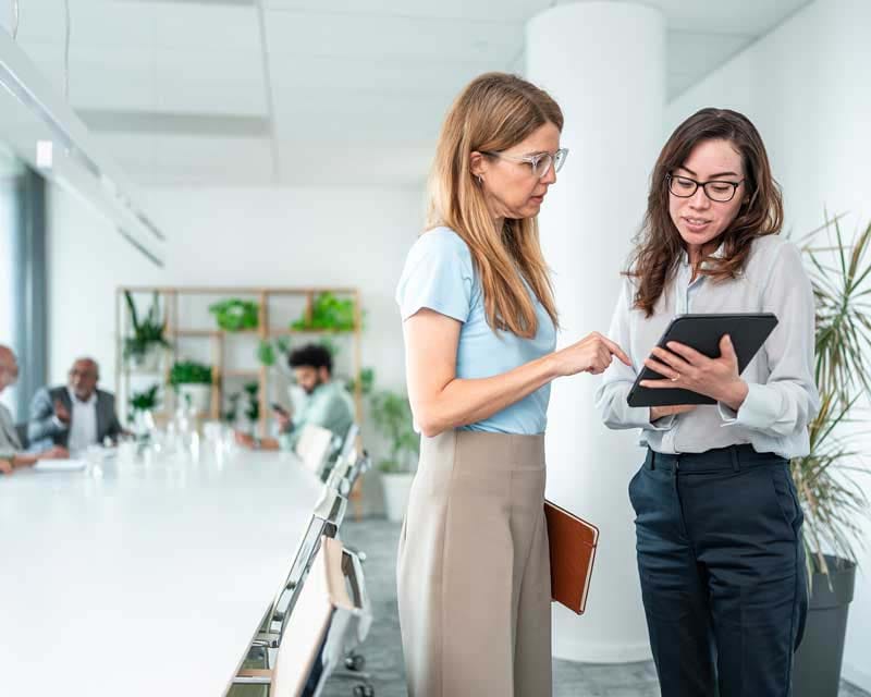 Office manager reviewing a cleaning plan for commercial office maintenance in Seattle